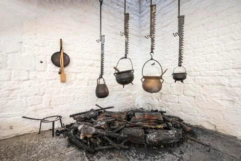 Pots hanging over a fire Stock Photos