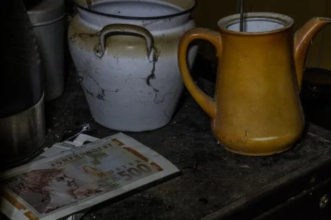 Pots with pattern and a bank note Stock Photos