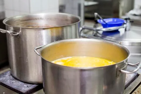 Pots on the stove Stock Photos