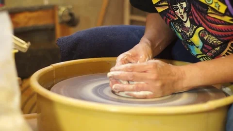 Potter centering clay on wheel Stock Footage 71939726