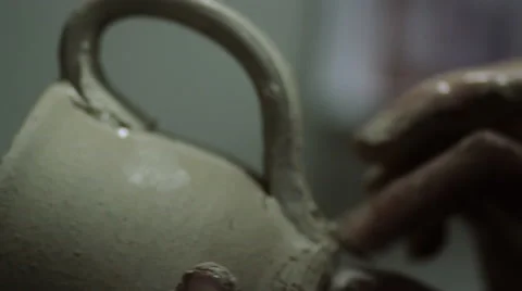 Potter Creates Clay Cup Stock Footage 60997439