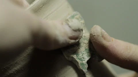 Potter Creates Image of a Cross on His Product Stock Footage 60997478