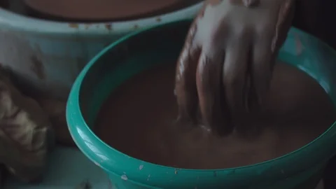 Potter creates a pitcher in the workshop Stock Footage 109280266