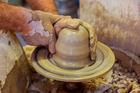 Potter creating a jar Stock Photos