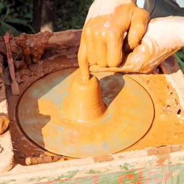 Potter hands. Stock Photos