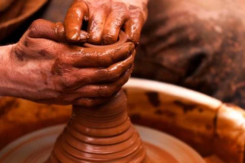 Potter hands pot Stock Photos