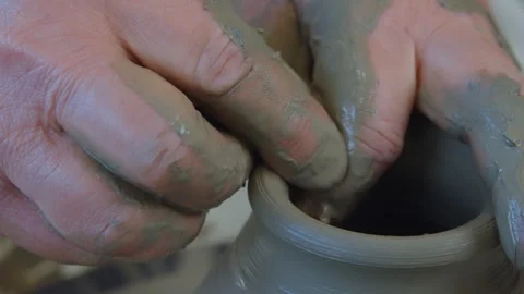 Potter Hands Shaping Clay Cup on Spinning Wheel Slow Motion Vídeos de archivo 328306109