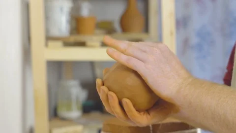 Potter kneads the clay Stock Footage 95626626