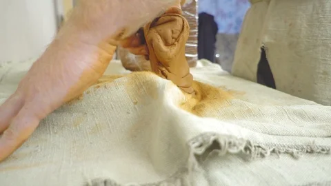 Potter kneads the clay Stock Footage 95677476