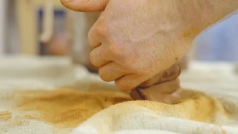 Potter kneads the clay Stock Footage 96675365