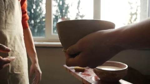 The potter made a plate of clay Stock Footage 102306328