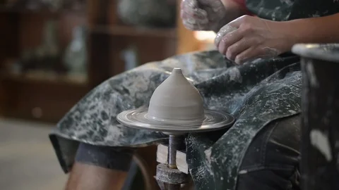 Potter makes earthenware on the circle Stock Footage 99746148