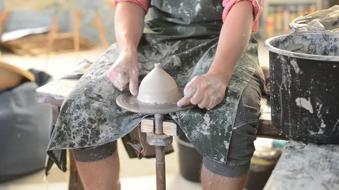 Potter makes earthenware on the circle Stock Footage 99746185