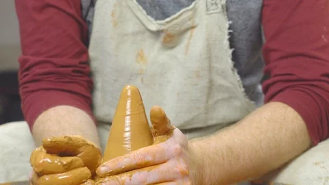 Potter makes a jug Stock Footage 95741814