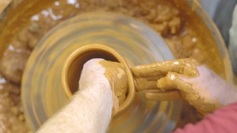 Potter makes a jug Stock Footage 95741948