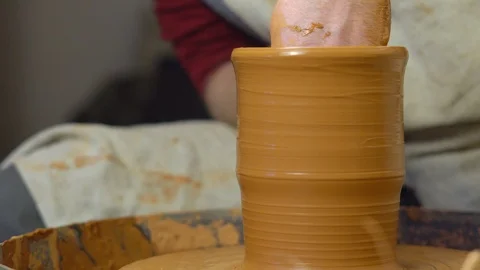 Potter makes a jug Stock Footage 96284303