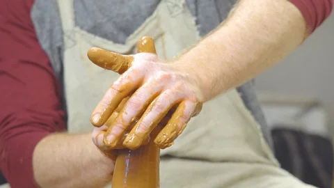 Potter makes a jug Stock Footage 96484788