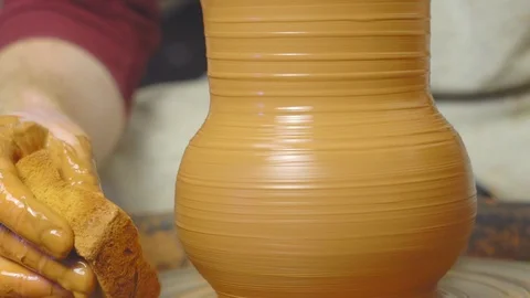 Potter makes a jug Stock Footage 96485514