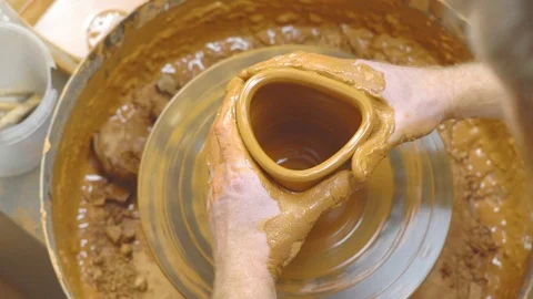 Potter makes a jug Stock Footage 96675372