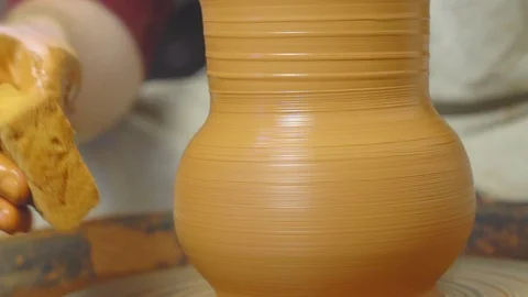 Potter makes a jug Stock Footage 97330729