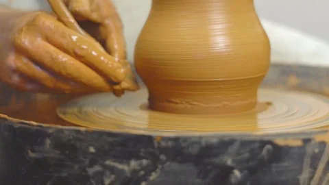 Potter makes a jug Stock Footage 97687867