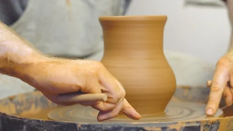 Potter makes a jug Stock Footage 97688227