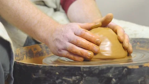 Potter makes a jug Stock Footage 97689573