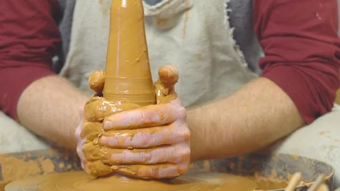 Potter makes a jug Stock Footage 97689965