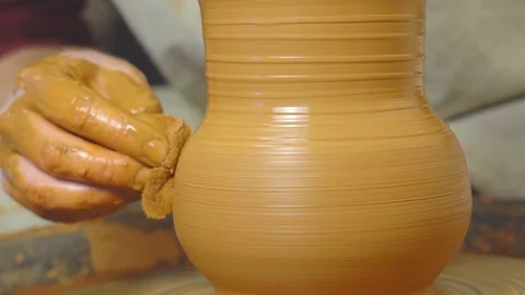 Potter makes a jug Stock Footage 98437861