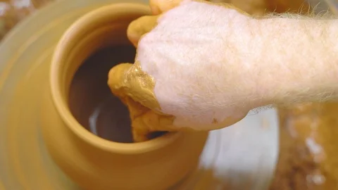 Potter makes a jug Stock Footage 99129729