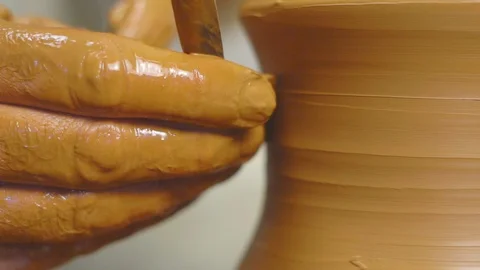 Potter makes a jug Stock Footage 99435350