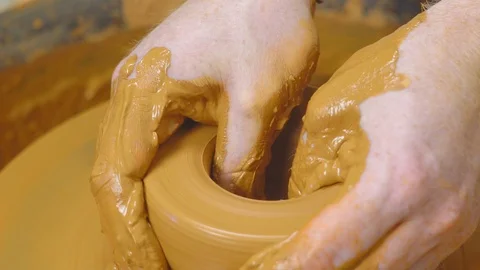 Potter makes a jug Stock Footage 99435950