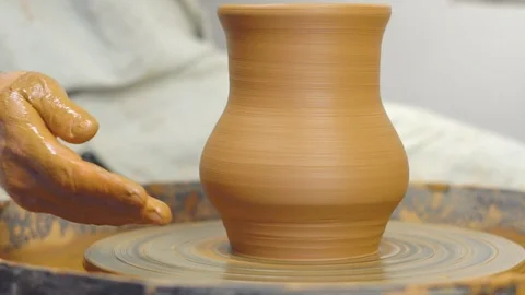 Potter makes a jug Stock Footage 100012695