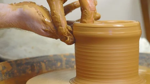 Potter makes a jug Stock Footage 101680221