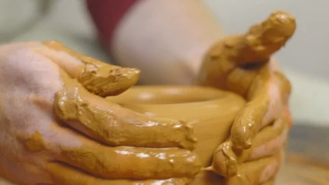 Potter makes a jug Stock Footage 103920894