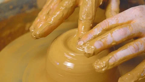 Potter makes a jug Stock Footage 104280408