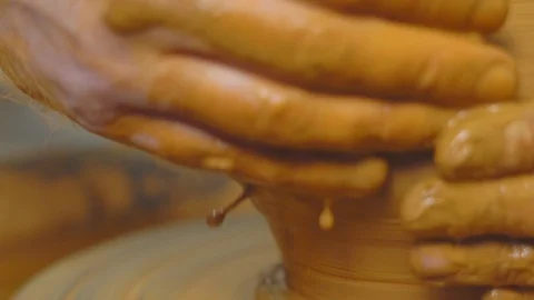 Potter makes a jug Stock Footage 106232546