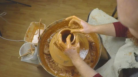 Potter makes a jug Stock Footage 106233330