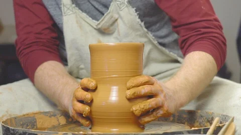 Potter makes a jug Stock Footage 106930092