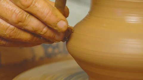 Potter makes a jug Stock Footage 112381309