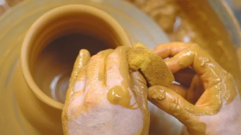 Potter makes a jug Stock Footage 112705321