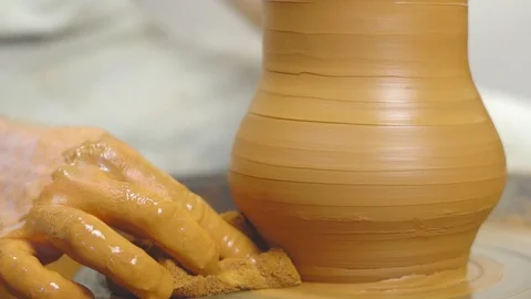 Potter makes a jug Stock Footage 113123109