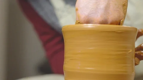 Potter makes a jug Stock Footage 115773100