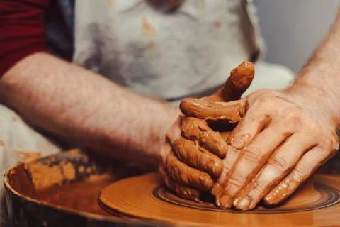 Potter makes a jug Stock Photos