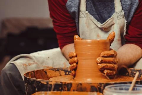 Potter makes a jug Stock Photos