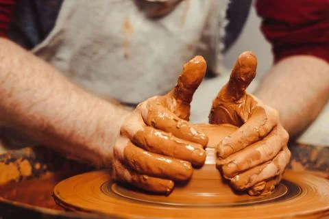 Potter makes a jug Stock Photos