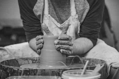 Potter makes a jug Stock Photos