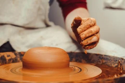 Potter makes a jug Stock Photos