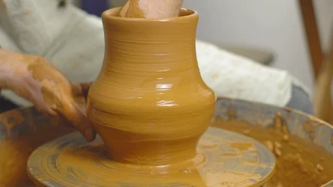 Potter makes a pitcher in the workshop Stock Footage 115567355