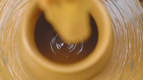 Potter makes a pitcher in the workshop Stock Footage 115567593